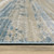 Homeroots Home Decor 10' x 13' Abstract Area Rug, Ivory Beige Grey Blue and Tan, Power Loom Stain Resistant with Fringe