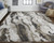 5' X 8' Brown and Ivory Abstract Power Loom Distressed Area Rug