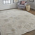 8' X 10' Tan And Brown Floral Hand Knotted Stain Resistant Area Rug