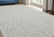 5' X 8' Taupe And Ivory Wool Abstract Tufted Handmade Stain Resistant Area Rug