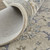 8' X 10' Ivory and Blue Wool Floral Hand Tufted Area Rug