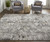 5' X 8' Gray and Ivory Abstract Power Loom Distressed Area Rug