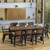 Nine Piece Black Plastic Outdoor Patio Set With Table