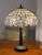 Homeroots Lighting 24" Stained Glass Two Light Accent Table Lamp, Stained Glass, Dark Brown Base