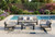Four Piece Black Metal Outdoor Patio Set With Table