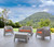 Four Piece Taupe and Beige Plastic Upholstered Cushions Outdoor Patio Set With Table