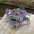 Five Piece Gray Plastic Outdoor Patio Set With Table