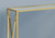 Homeroots 12" x 42.25" x 32.25" Gold Clear Metal Tempered Glass Accent Table