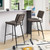 Homeroots Living Room Set of Two 39" Low Back Bar Height Bar Chairs, Vintage Brown Faux Leather and Black