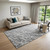 5' X 8' Charcoal And Ivory Abstract Washable Area Rug With UV Protection