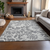 10' X 14' Gray And Ivory Floral Washable Area Rug With UV Protection