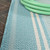 8' Aqua And Beige Striped Indoor Outdoor Runner Rug