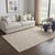 5' X 8' Beige Gray And Ivory Wool Hand Woven Area Rug