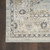 8' Beige And Blue Floral Medallion Distressed Runner Rug With Fringe