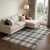 10' X 14' Black Red And Ivory Plaid Washable Area Rug With UV Protection