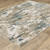 5' X 8' Beige Ivory And Teal Abstract Area Rug With Fringe