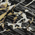 5' X 8' Black Ivory And Gold Striped Washable Area Rug With UV Protection