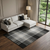 10' X 14' Black Ivory And Gold Plaid Washable Area Rug With UV Protection