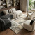 8' X 11' Tan And White Abstract Washable Area Rug With UV Protection