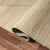 5' X 8' Green And Beige Jute Abstract Hand Woven Area Rug