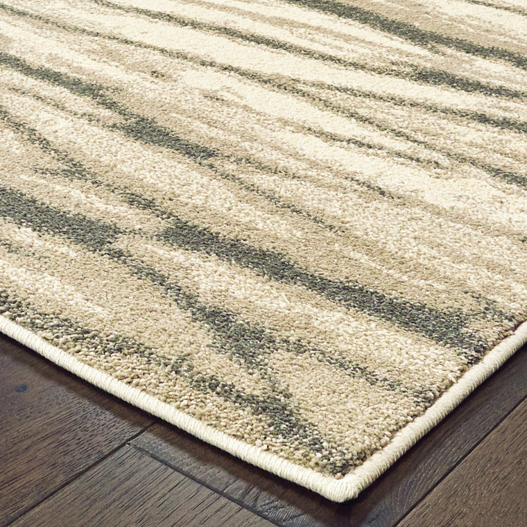 Homeroots Home Decor 8' x 10' Ivory Sand and Ash Abstract Power Loom Stain Resistant Area Rug