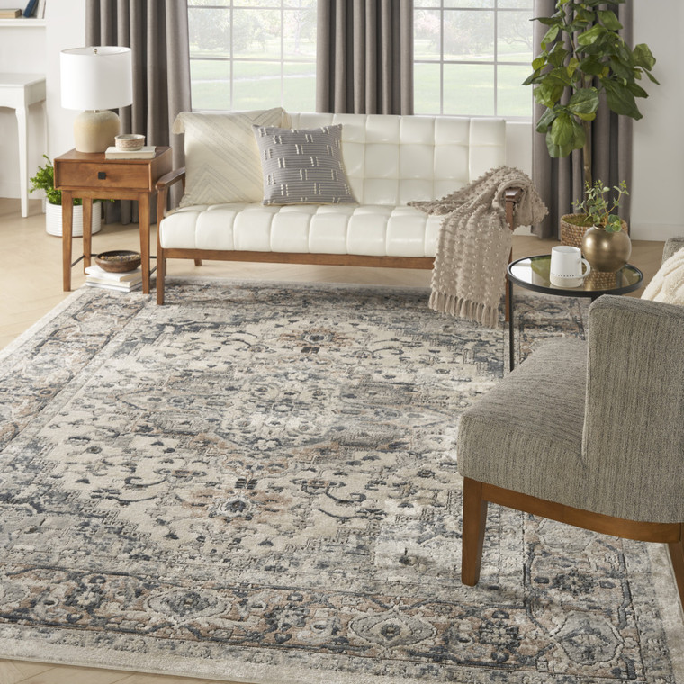 7' X 10' Ivory Floral Power Loom Area Rug