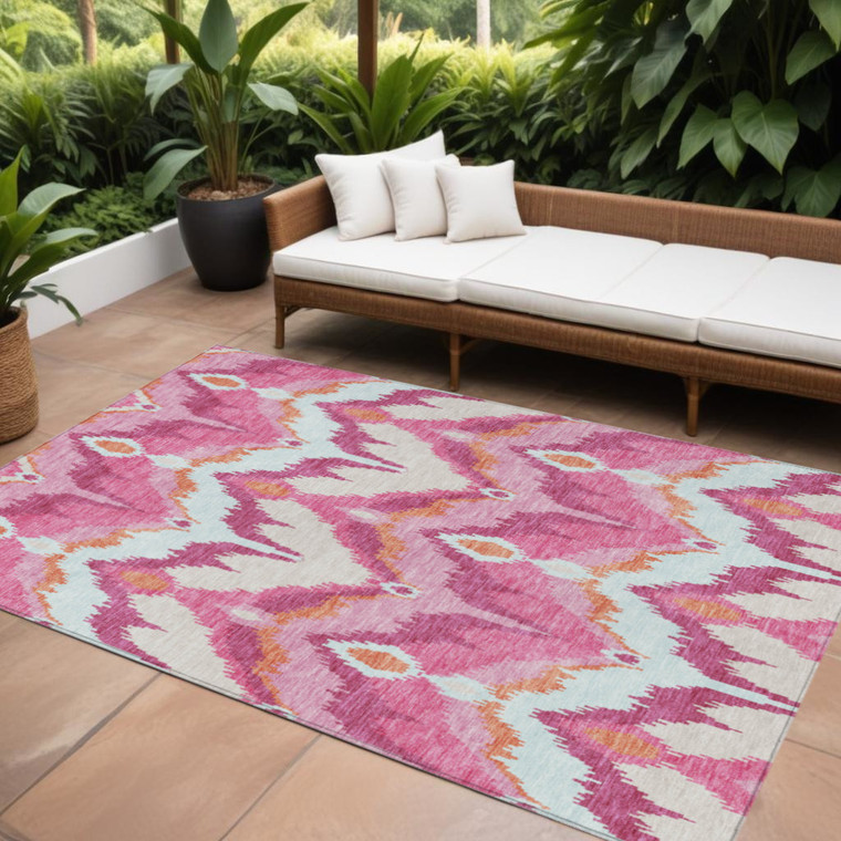10' X 14' Pink Mauve And Orange Ikat Washable Indoor Outdoor Area Rug