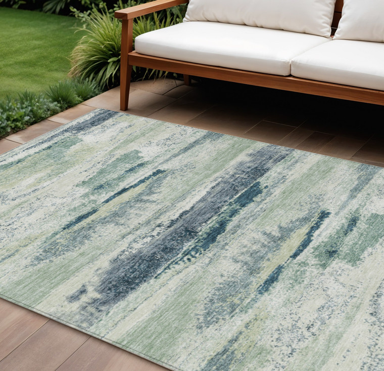 10' X 14' Mint Green Ivory And Denim Blue Abstract Washable Indoor Outdoor Area Rug
