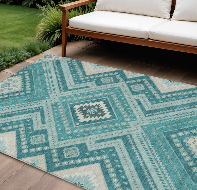 9' X 12' Teal Blue And Ivory Tribal Washable Indoor Outdoor Area Rug