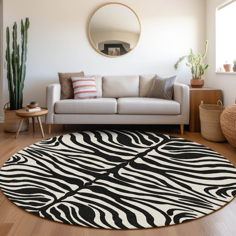 8' Black And Ivory Round Animal Print Washable Indoor Outdoor Area Rug