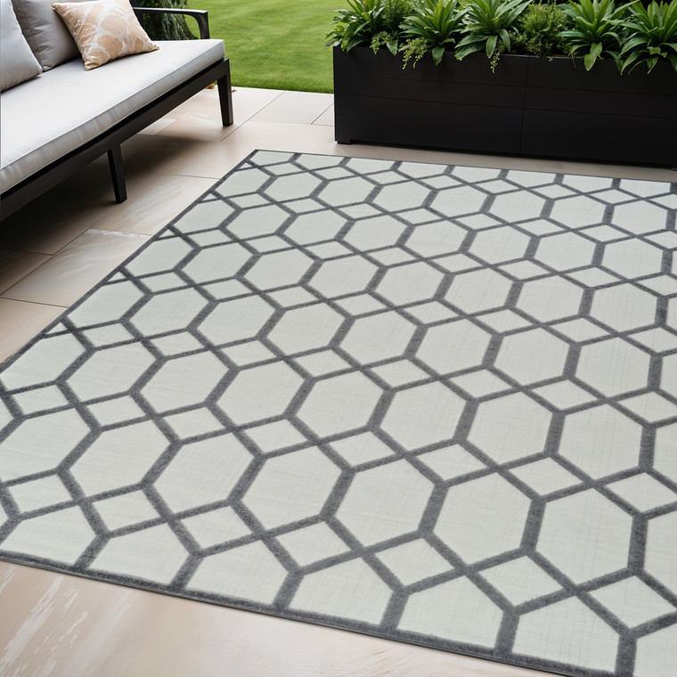 5' X 7' Beige And Gray Geometric Distressed Indoor Outdoor Area Rug