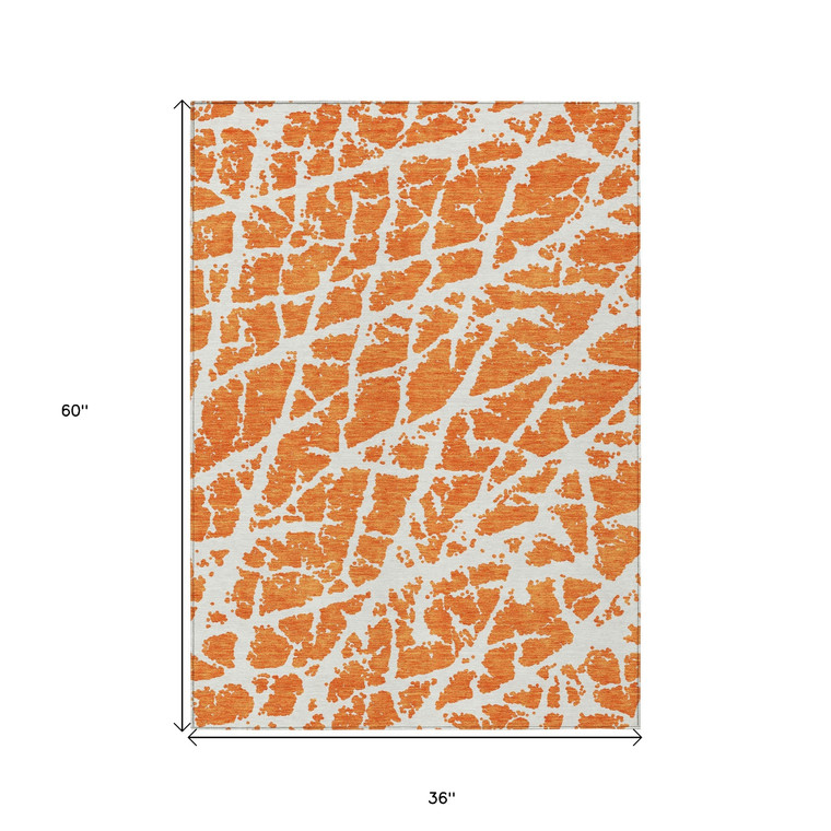 3' X 5' Orange and White Abstract Washable Non Skid Indoor Outdoor Area Rug