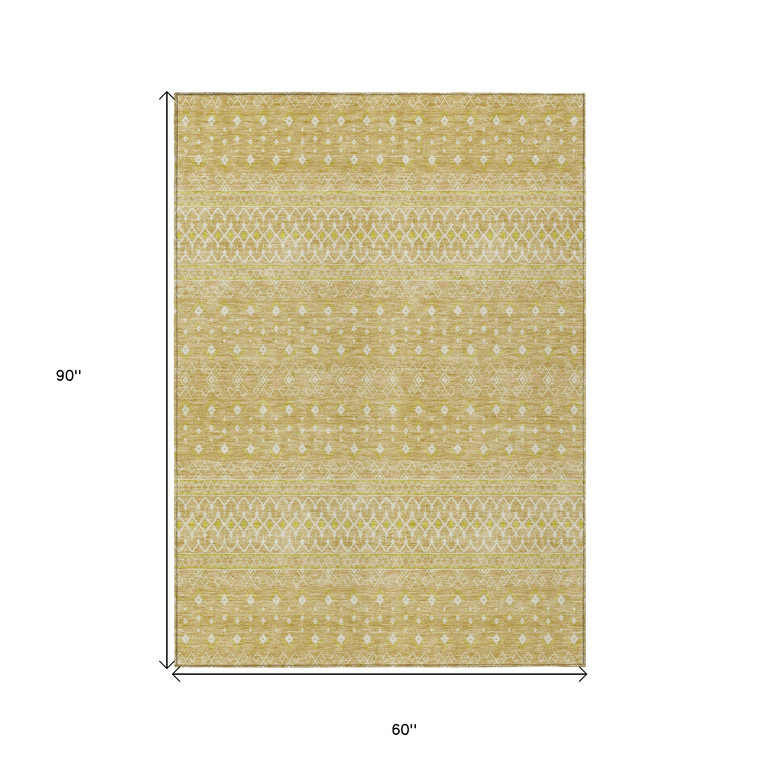 5' X 8' Gold Ivory And Taupe Tribal Washable Indoor Outdoor Area Rug