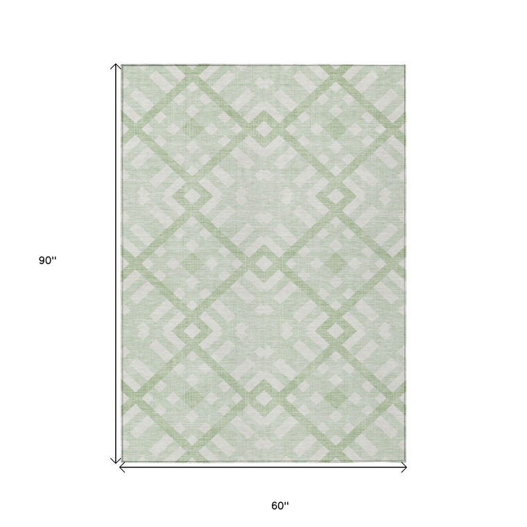 5' X 8' Mint Green And Ivory Geometric Washable Indoor Outdoor Area Rug