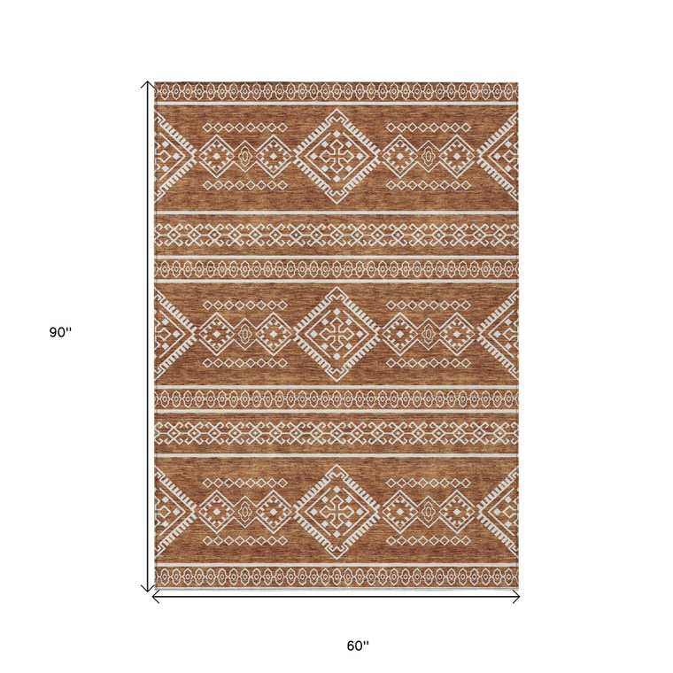 5' X 8' Orange And Ivory Southwestern Washable Indoor Outdoor Area Rug