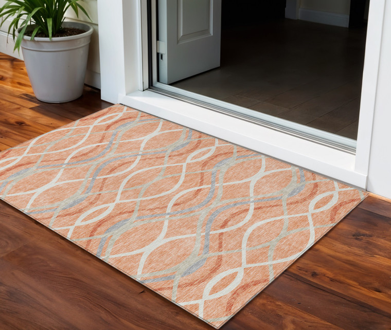 3' X 5' Peach Orange And Gray Abstract Washable Indoor Outdoor Area Rug