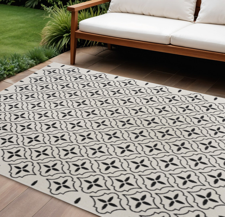 6' X 9' Ivory And Black Geometric Indoor Outdoor Area Rug