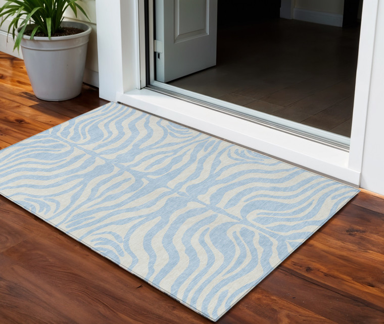 3' X 5' Sky Blue And Ivory Animal Print Washable Indoor Outdoor Area Rug