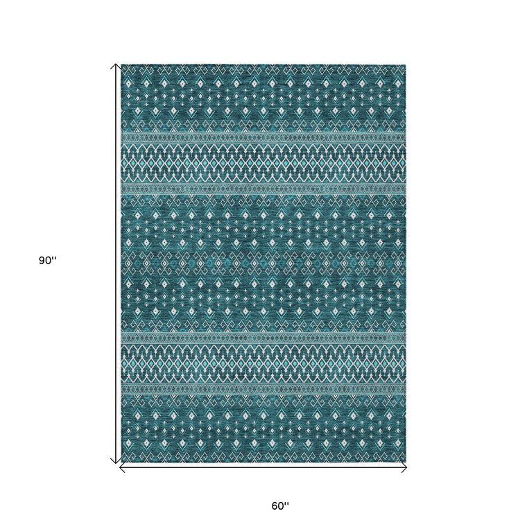 5' X 8' Teal Blue Aqua And Ivory Tribal Washable Indoor Outdoor Area Rug