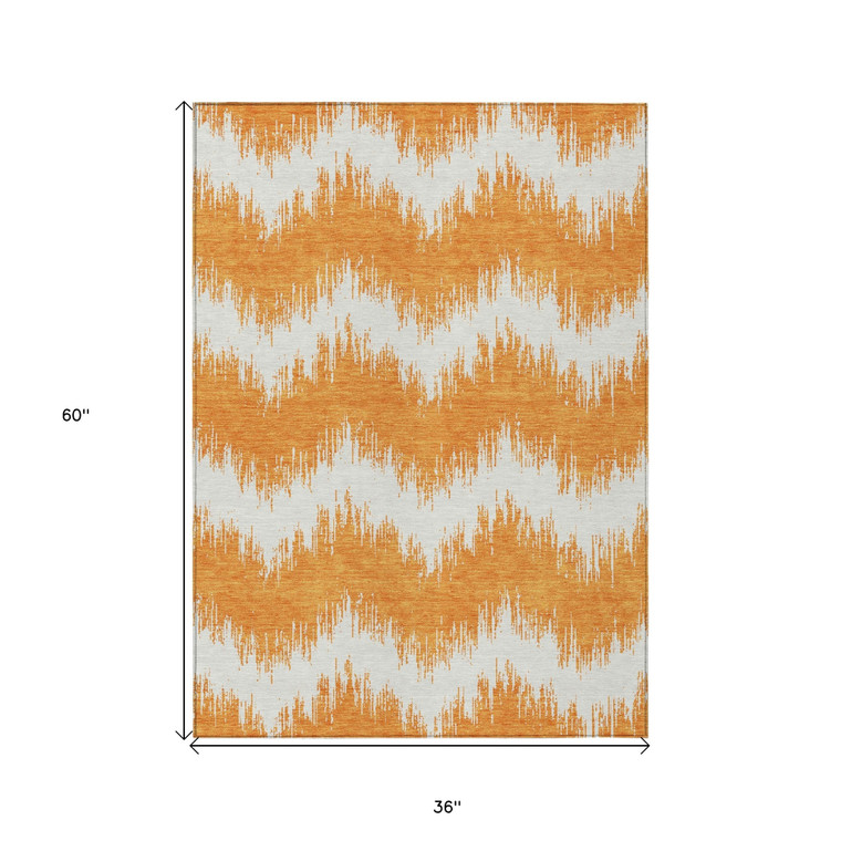 3' X 5' Orange And Ivory Chevron Washable Indoor Outdoor Area Rug