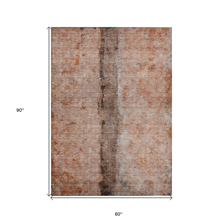 5' X 8' Orange Peach And Brown Abstract Washable Indoor Outdoor Area Rug
