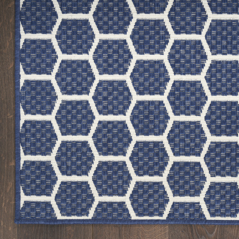 10' Navy Blue And Ivory Geometric Indoor Outdoor Runner Rug