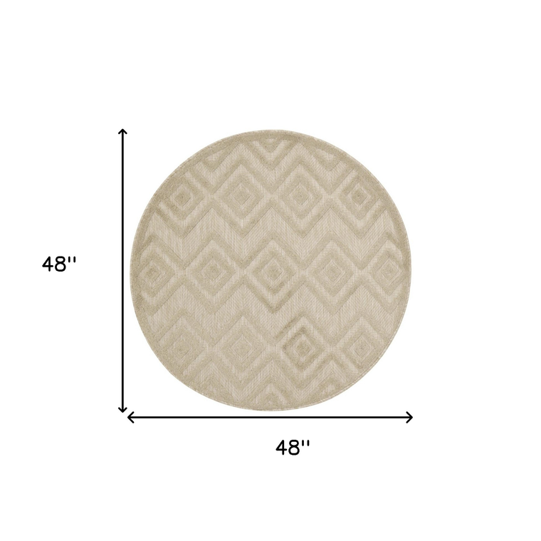4' Cream And Beige Round Geometric Indoor Outdoor Area Rug