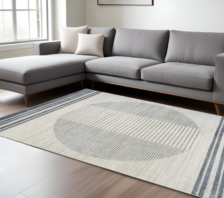 9' X 12' Blue And Ivory Geometric Washable Area Rug