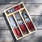 Jean Dubost 24 Pc Everyday Flatware Set with Red Handles in a tray