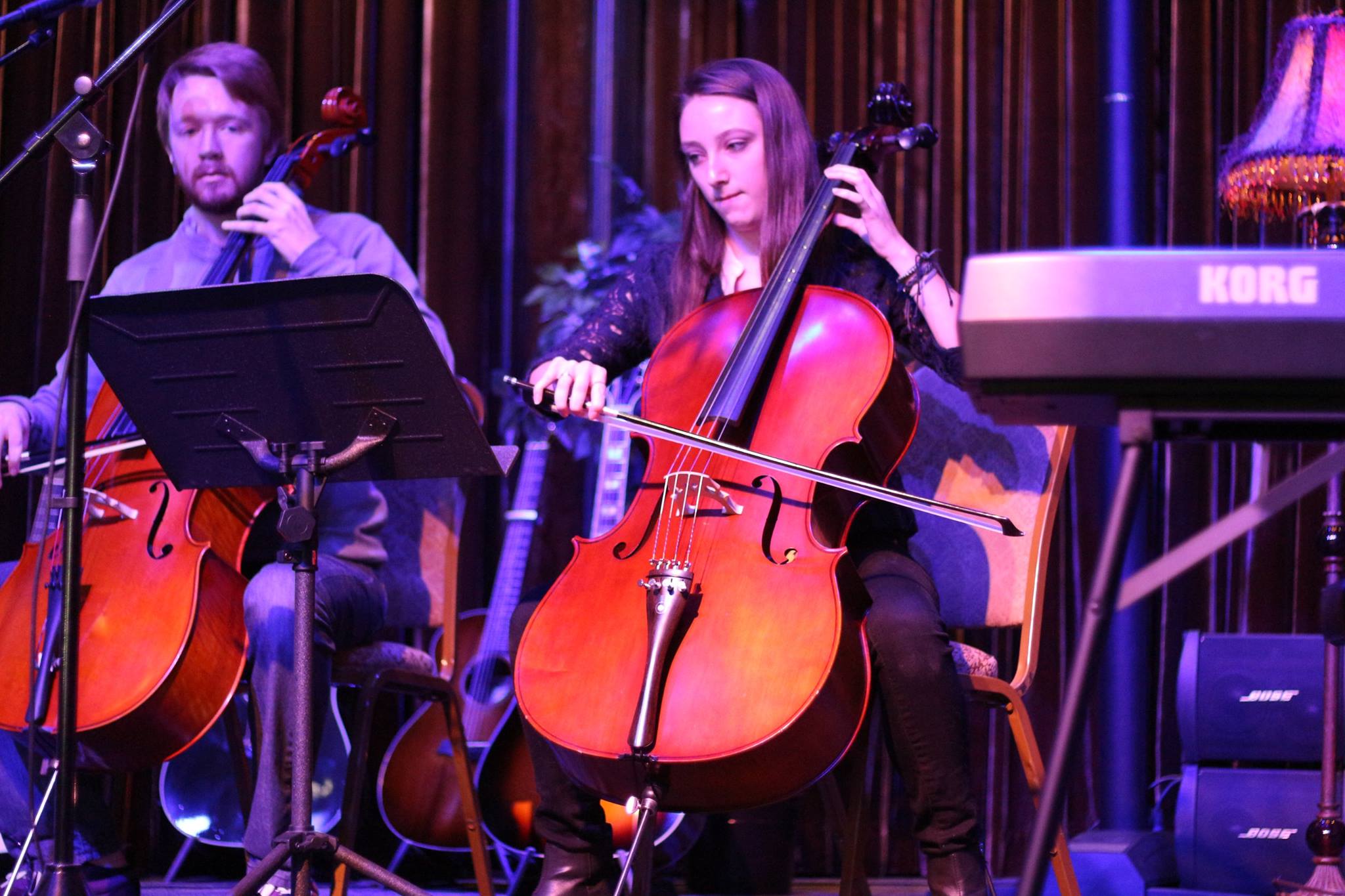 Aliya Mustafina and woman playing instruments