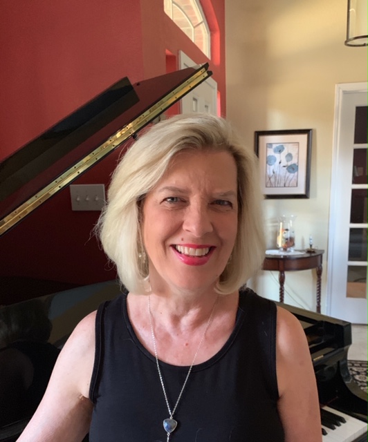 a woman smiling for the camera