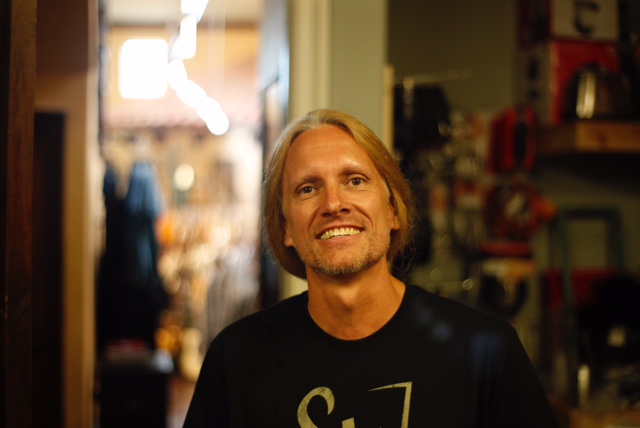 a man smiling for the camera