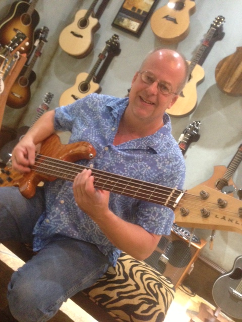 a person playing a guitar