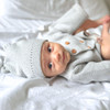 Bundle of Joy Grey Baby Gift Basket - Baby wearing hat and sweater